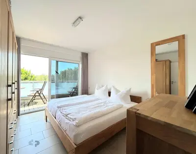 Ein Bett oder Betten in einem Zimmer der Unterkunft OSTSEEPANORAMA Penth Nr 29 max 4 Pers