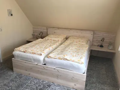 Ein Bett oder Betten in einem Zimmer der Unterkunft 