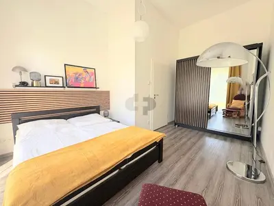 Ein Bett oder Betten in einem Zimmer der Unterkunft STRANDFLIEDER App Nr 05 max 3 Pers