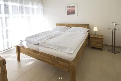 Ein Bett oder Betten in einem Zimmer der Unterkunft WINDLICHT App Nr 3 max 4 Pers