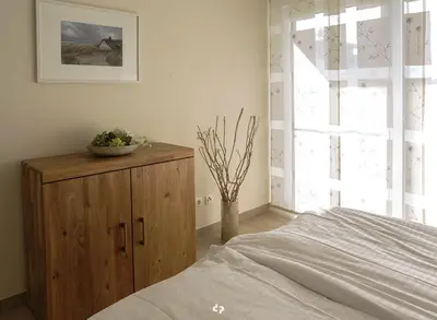 Ein Bett oder Betten in einem Zimmer der Unterkunft WINDLICHT App Nr 3 max 4 Pers