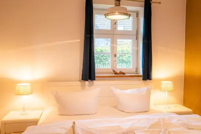 Ein Bett oder Betten in einem Zimmer der Unterkunft Ferienhaus Ankerplatz