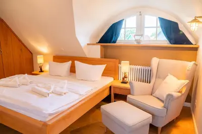 Ein Bett oder Betten in einem Zimmer der Unterkunft Ferienhaus Ankerplatz