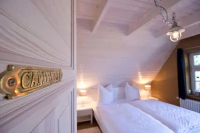 Ein Bett oder Betten in einem Zimmer der Unterkunft Ferienhaus Ankerplatz