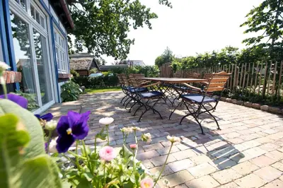 Ein Garten an der Unterkunft Ferienhaus Ankerplatz