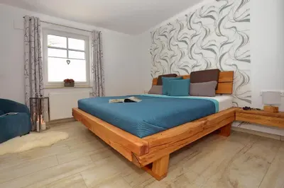 Ein Bett oder Betten in einem Zimmer der Unterkunft Ankerplatz Zingst