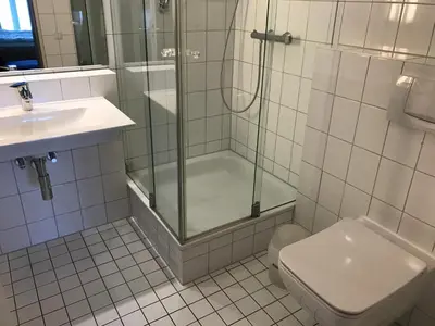 Ein Badezimmer in der Unterkunft Komfortapartment Zingster-Meerblick