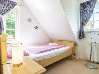 Ein Bett oder Betten in einem Zimmer der Unterkunft Residenz 