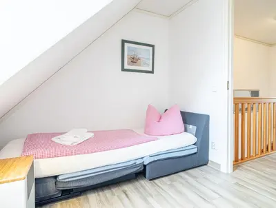 Ein Bett oder Betten in einem Zimmer der Unterkunft Residenz 