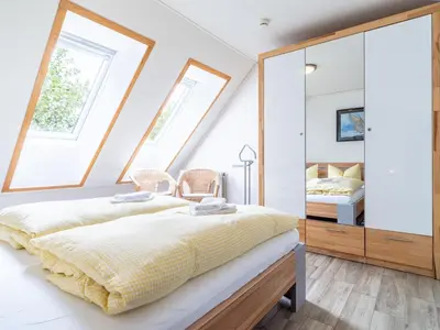 Ein Bett oder Betten in einem Zimmer der Unterkunft Residenz 