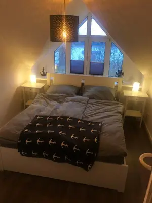 Ein Bett oder Betten in einem Zimmer der Unterkunft Harmonie