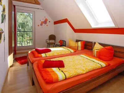 Ein Bett oder Betten in einem Zimmer der Unterkunft Doppelhaushaelfte am Hafen von Neuendorf