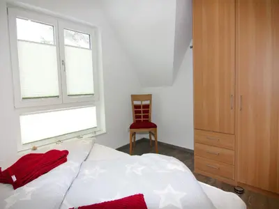 Ein Bett oder Betten in einem Zimmer der Unterkunft Semi-detached house, Zingst