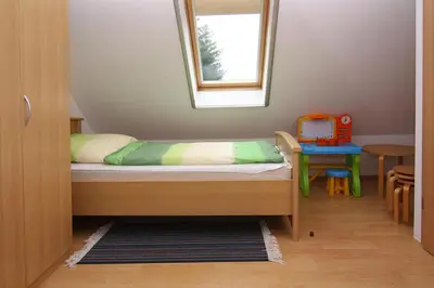 Ein Bett oder Betten in einem Zimmer der Unterkunft Reihenhaus im Ostseebad Zingst