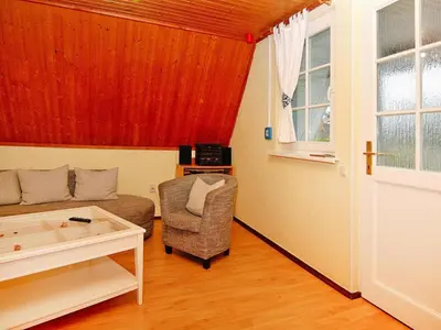 Ein Sitzbereich in der Unterkunft Ferienwohnung am Bodstedter Bodden