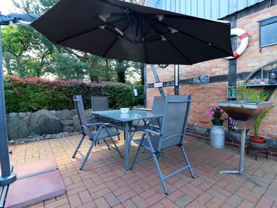 Ein Patio oder anderer Außenbereich in der Unterkunft Ferienwohnung, Wieck am Darß