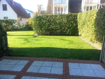 Ein Garten an der Unterkunft Birkenstraße 7 Whg 1