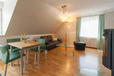 Ein Sitzbereich in der Unterkunft Gustavs Apartment