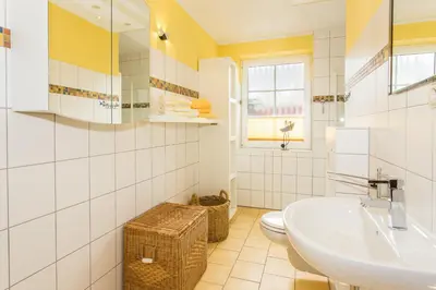 Ein Badezimmer in der Unterkunft Deichweg 12
