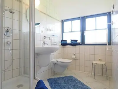 Ein Badezimmer in der Unterkunft Ferienhaus Weinhardt - Whg 2