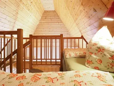 Ein Bett oder Betten in einem Zimmer der Unterkunft Ferienhaus Weinhardt - Whg 2