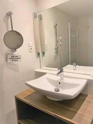 Ein Badezimmer in der Unterkunft Strandperle Zingst - Ap 409