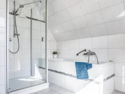 Ein Badezimmer in der Unterkunft Max Hünten Weg 2