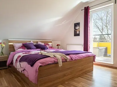 Ein Bett oder Betten in einem Zimmer der Unterkunft Wiesenstraße 2 Whg 2