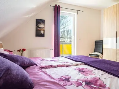 Ein Bett oder Betten in einem Zimmer der Unterkunft Wiesenstraße 2 Whg 2