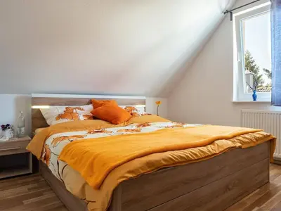 Ein Bett oder Betten in einem Zimmer der Unterkunft Wiesenstraße 2 Whg 2