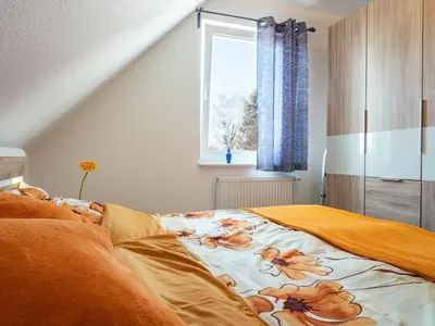 Ein Bett oder Betten in einem Zimmer der Unterkunft Wiesenstraße 2 Whg 2