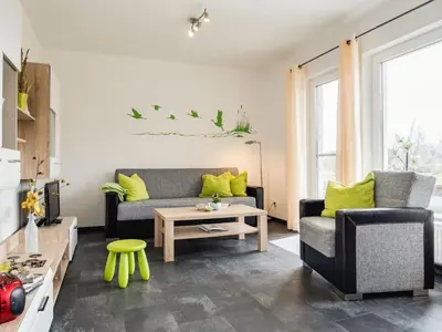 Ein Sitzbereich in der Unterkunft Wiesenstraße 2 Whg 1