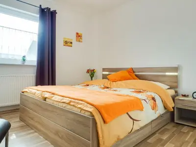 Ein Bett oder Betten in einem Zimmer der Unterkunft Wiesenstraße 2 Whg 1