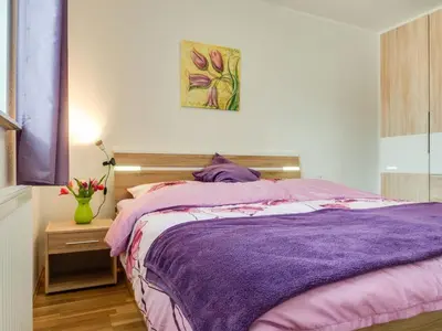 Ein Bett oder Betten in einem Zimmer der Unterkunft Wiesenstraße 2 Whg 1