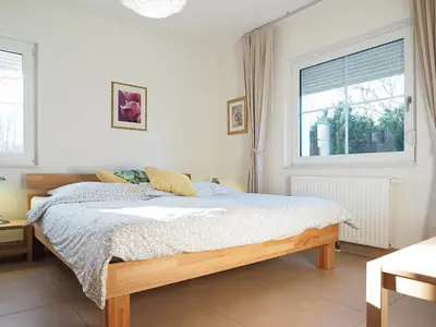 Ein Bett oder Betten in einem Zimmer der Unterkunft Am Paalen 2 Whg 1