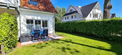 Ein Garten an der Unterkunft Birkenstraße 7 Whg 3