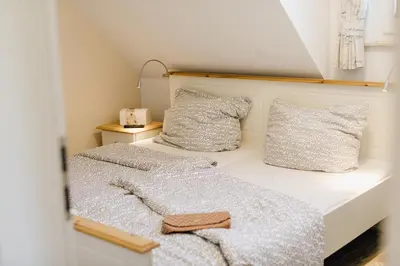 Ein Bett oder Betten in einem Zimmer der Unterkunft Whg 12 - Kranichrast