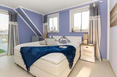 Ein Bett oder Betten in einem Zimmer der Unterkunft Whg 15 - Strandläufer