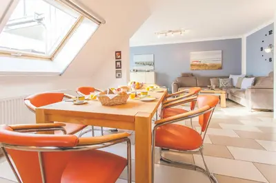 Ein Sitzbereich in der Unterkunft Birkenperle Wohnung 5