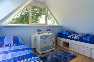 Ein Bett oder Betten in einem Zimmer der Unterkunft Ferienhaus Strandschnecke
