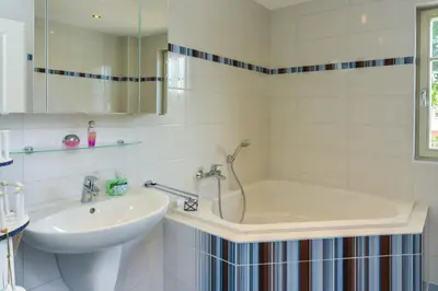 Ein Badezimmer in der Unterkunft Ferienhaus Strandschnecke