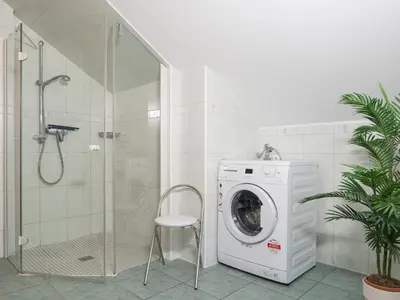Ein Badezimmer in der Unterkunft Birkenstraße 7 Whg 6