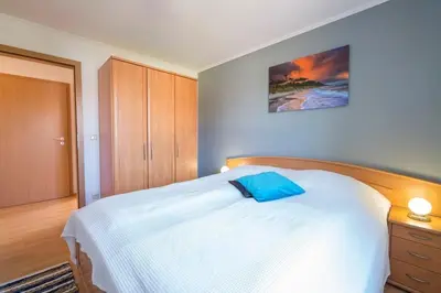 Ein Bett oder Betten in einem Zimmer der Unterkunft Hoppenberg 5a
