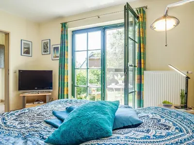 Ein Bett oder Betten in einem Zimmer der Unterkunft App Am Paalen 18