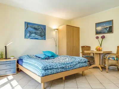 Ein Bett oder Betten in einem Zimmer der Unterkunft App Am Paalen 18