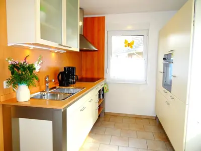 Küche/Küchenzeile in der Unterkunft Birkenstraße 6j