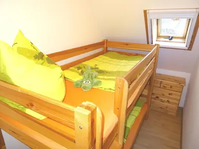 Ein Bett oder Betten in einem Zimmer der Unterkunft Birkenstraße 6K
