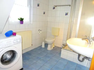 Ein Badezimmer in der Unterkunft Birkenstraße 6K