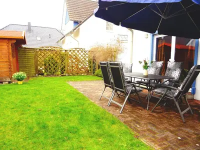 Ein Garten an der Unterkunft Birkenstraße 6K