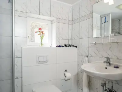 Ein Badezimmer in der Unterkunft Seenest Whg 1